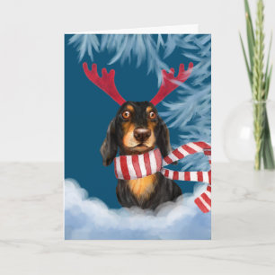 Tarjeta Festiva Dachshund a través de la nieve