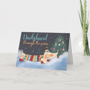 Tarjeta Festiva Dachshund a través de la nieve