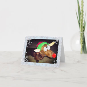 Tarjeta Festiva Dacshund a través del elfo de los navidades de nie