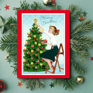 Tarjeta Festiva Dama antigua de los años 20 decorando el árbol de