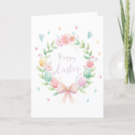 Tarjeta Festiva Delicada corona de Pascua con flores y huevos