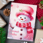 Tarjeta Festiva Deseos más cálidos Adorables Snowman rosa<br><div class="desc">Envíe un acogedor saludo de vacaciones con esta encantadora tarjeta que incluye un muñeco de nieve feliz vestido con un gorra rosa y una bufanda, ambientada en un telón de fondo nevado. El mensaje "Los deseos más cálidos" agrega un toque más sincero, haciendo de esta tarjeta la opción perfecta para...</div>