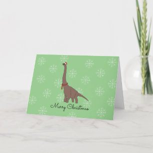 Tarjeta Festiva Dinosaur marrón con copos de nieve de sombrero de