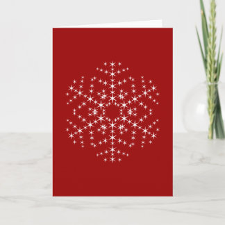 Tarjeta Festiva Diseño de copos de nieve en rojo oscuro y blanco.