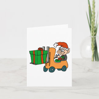 Tarjeta Festiva duende con el paquete en la carretilla elevadora
