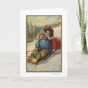 Tarjeta Festiva El Sledding de las niñas de ChristmasTwo