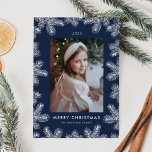 Tarjeta Festiva Elegant Navy and White Pine Frame Photo<br><div class="desc">Elegant holiday card featuring your vertical photo framed by white pine boughs with a navy background. Personalize the pine branch holiday card with a custom greeting,  the year,  and your family name. The card reverses to display your custom message in white lettering.</div>