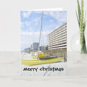 TARJETA FESTIVA ESCENA DE PLAYA "FELIZ NAVIDAD" CON CATAMARAN