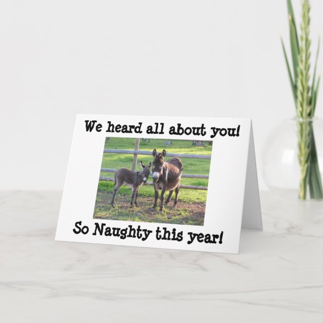 TARJETA FESTIVA ESCUCHÉ QUE ESTABAS **NAUGHTE** ESTE AÑO (Anverso)