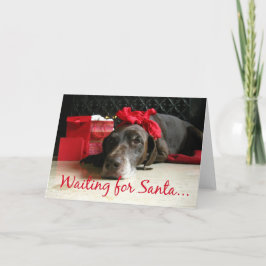 Tarjeta Festiva esperando el puntero y los regalos de santa en la 