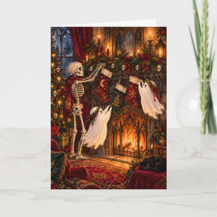 Tarjeta Festiva Esqueleto y adorable fantasma colgando medias en C