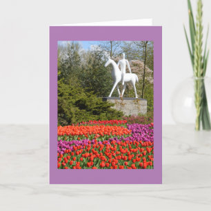 Tarjeta Festiva Estatua y tulipanes