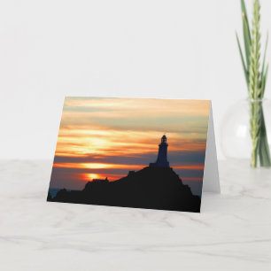 Tarjeta Festiva Faro de Corbiere al atardecer