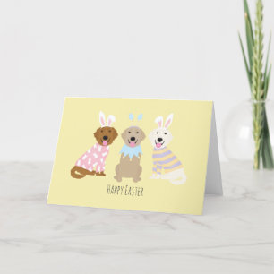 Tarjeta Festiva Felices perros recuperadores de oro de Pascua