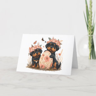 Tarjeta Festiva Felices perros Rottweiler de Pascua