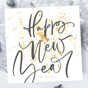 Tarjeta Festiva Feliz Año Nuevo con texto escrito a mano en gris