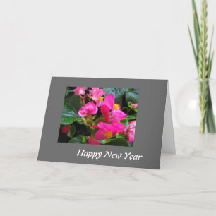 Tarjeta Festiva Feliz Año Nuevo flores de begonia rosadas