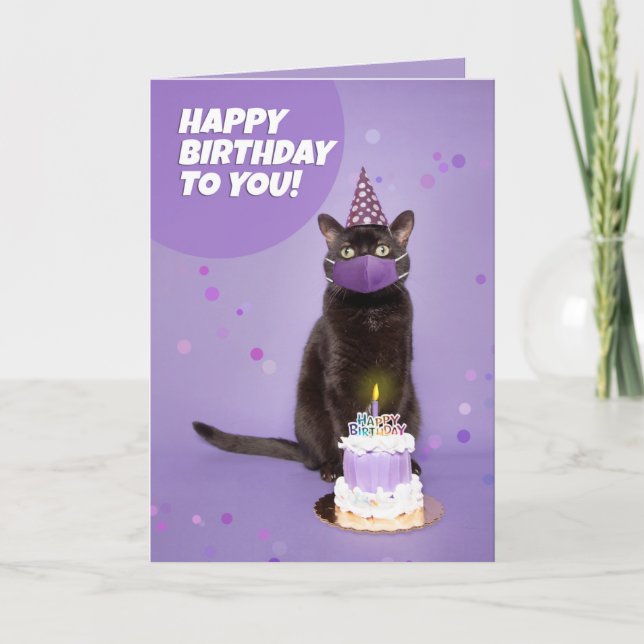 Tarjeta Festiva Feliz cumpleaños, gato negro en máscara de la cara (Anverso)