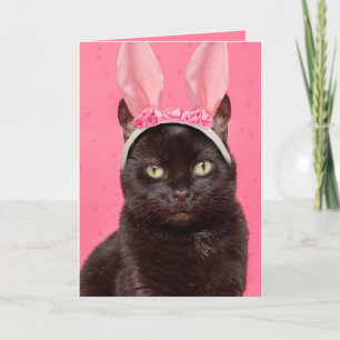 Tarjeta Festiva Feliz Gato Negro de Pascua en las orejas de los co