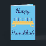 Tarjeta Festiva Feliz Hanukkah Blue Menorah<br><div class="desc">Celebra el gran festival de las luces con esta tarjeta de felicitación temática Happy Hanukkah. "Happy Hanukah" está escrito con hermosas letras cursivas de azul oscuro con velas azules. El interior de la tarjeta tiene un mensaje encantador. ¡Elige la tuya! Cortesía de Sonya DeHart Design en: http://www.sonyadehartdesign.com |http://www.sonyadehartdesign.etsy.com</div>