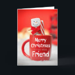 Tarjeta Festiva Feliz Navidad, amigo marshmallow Snowman<br><div class="desc">Agitando una taza roja llena de cacao caliente,  este feliz muñeco de nieve malvavisco es una manera adorable de desear a tu amigo especial una Feliz Navidad.</div>