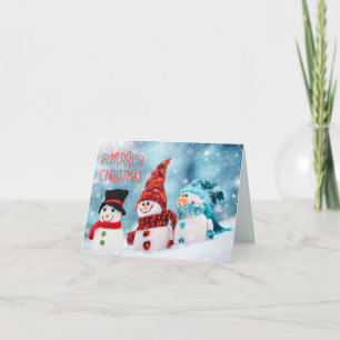 Tarjeta Festiva Feliz Navidad, divertidos hombres de nieve con esc