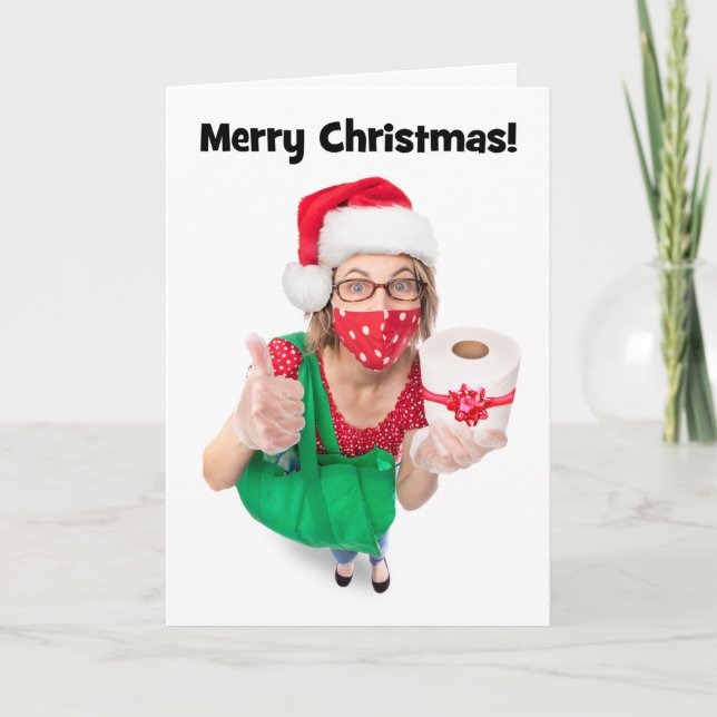 Tarjeta Festiva Feliz Navidad, mujer divertida con regalo de papel (Anverso)