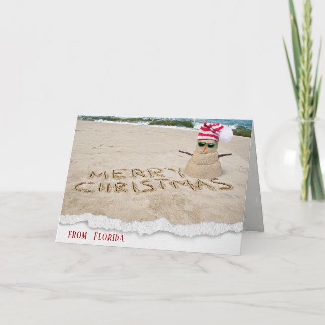 Tarjeta Festiva Feliz Navidad, muñeco de nieve tropical a orillas  (Anverso)