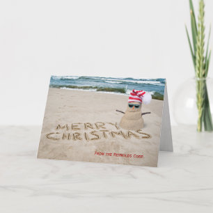 Tarjeta Festiva Feliz Navidad, snowman de arena para los negocios