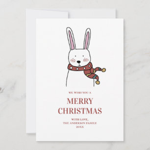 Tarjeta Festiva Feliz Navidad. Un bonito conejo de invierno. Anima