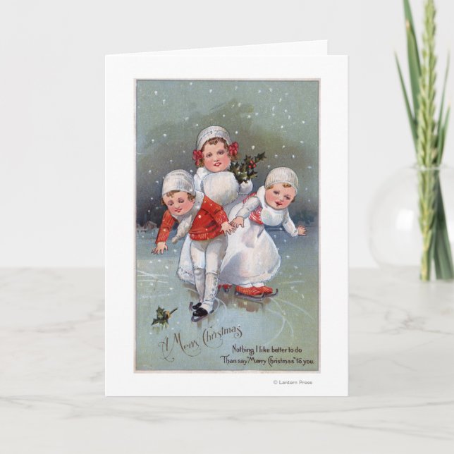 Tarjeta Festiva Feliz NavidadPequeños niños patinando hielo (Anverso)
