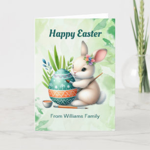 Tarjeta Festiva Feliz Pascua, dulce conejita pintando un huevo de