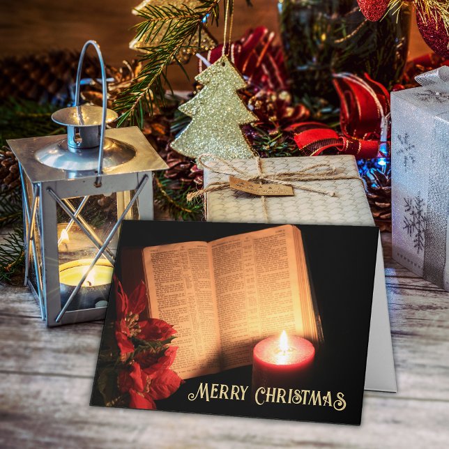 Tarjeta Festiva Flor de Nochebuena con Vela Biblia Antigua (Merry Christmas greeting card with Bible, poinsettia and votive candle.)