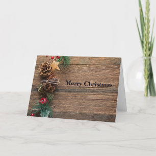 Tarjeta Festiva fondo de madera con piñas