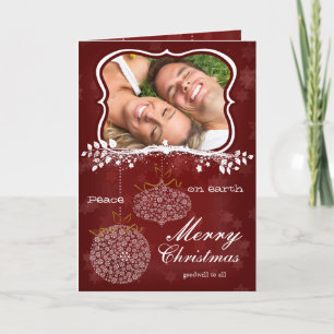 Tarjeta Festiva Foto: Ornamentos blancos de las estrellas rojas de