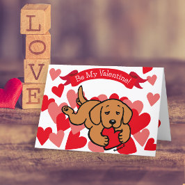 Tarjeta Festiva Fox Red Labrador Puppy masticando el corazón Valen