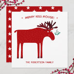 Tarjeta Festiva Funny Moose<br><div class="desc">Merry Kiss Moose funny red and white Christmas holiday card featuring a whimsical moose or elk with a bunch of mistletoe tied to his antler,  hoping for a cheeky kiss.
Change or remove the family name,  and change the message to customize.</div>