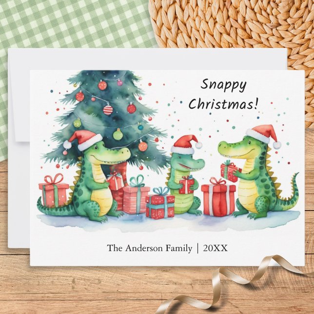 Tarjeta Festiva Funny Whimsical Alligator Family Snappy Navidades (A funny Christmas card featuring a family of alligators opening festive gifts, in a watercolor style)