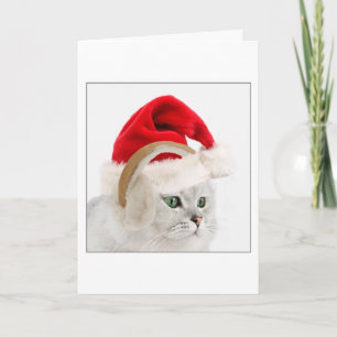 Tarjeta Festiva Gatito en manguitos del gorra y del oído de Santa