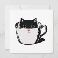 Gatito negro con nariz roja escondido en una taza