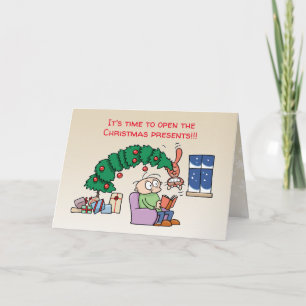 Tarjeta Festiva Gato divertido colgando del árbol de Navidad, foto