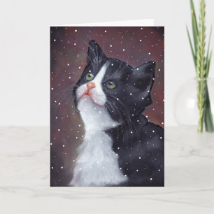 Tarjeta Festiva Gato esmoquin mirando hacia arriba a copos de niev