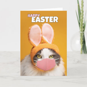 Tarjeta Festiva Gato feliz de Pascua en orejas de conejito y humor