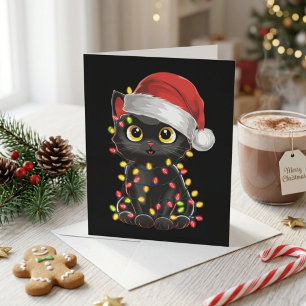Tarjeta Festiva Gato negro lindo con sombrero de Santa y luces de 
