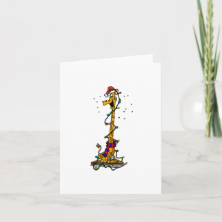 Tarjeta Festiva Giraffe en luces en trineo