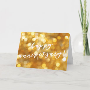 Tarjeta Festiva Glamorosas espumas de oro en aniversario feliz