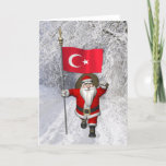 Tarjeta Festiva Gracioso Papá Noel Con Bandera De Turquía<br><div class="desc">se puede cambiar el color de fondo: PERSONALIZAR padre Navidad visitando la República de Turquía que es un país con su parte más pequeña en el sureste de Europa y su mayor parte en Asia Occidental - saludando alegremente el símbolo nacional llamado Albayrak ("Bandera Roja") / Alsanak ("Sagrado Estándar Rojo")...</div>