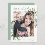 Tarjeta Festiva Greenery Faith Love and Family Photo<br><div class="desc">This greenery faith love and family photo card is the perfect simple photo card. The winter design features soft sage green watercolor eucalyptus and modern botanicals with sprigs of classic red holly berries. Personalize the card with a family photo,  your family name,  and year.</div>