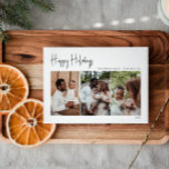 Tarjeta Festiva Guión moderno Felices Fiestas Tres Fotos<br><div class="desc">Esta moderna escritura feliz vacaciones vacaciones de tres fotos tarjeta de vacaciones es perfecta para tu minimalista y chic saludo de vacaciones en blanco y negro. La caligrafía escrita a mano, mínima y caprichosa, es delicada y rústica, aunque elegante y elegante. El diseño refleja un simple día de invierno blanco...</div>