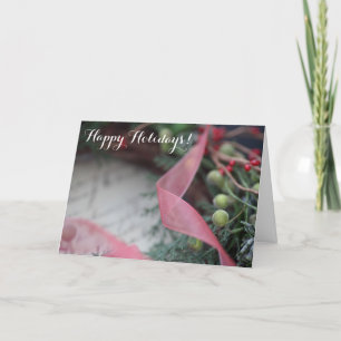 Tarjeta Festiva Guirnalda verde con las bayas, cinta